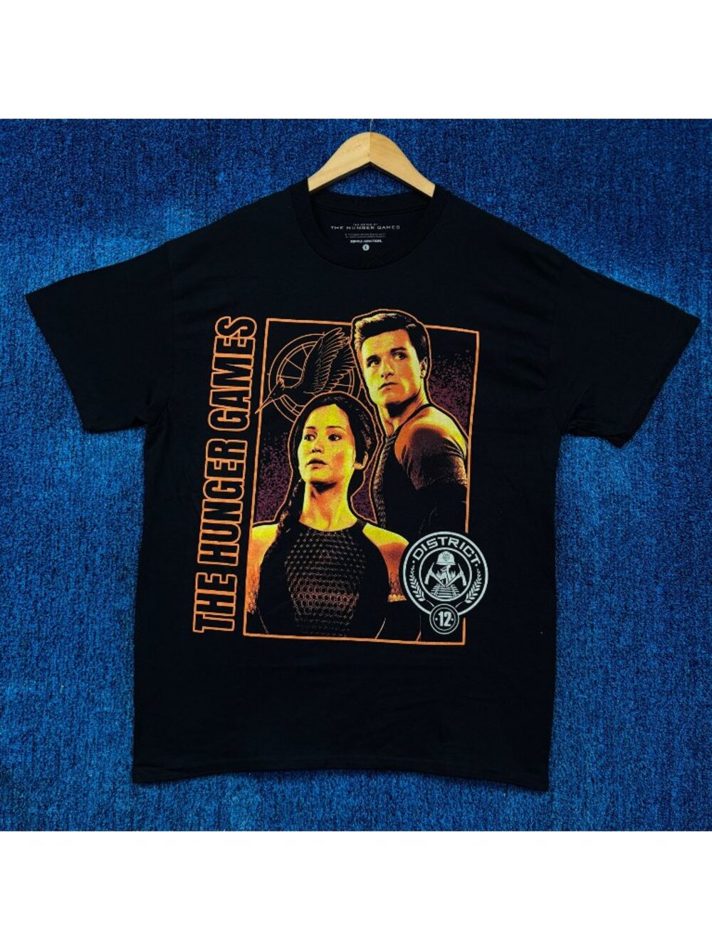 The Hunger Games Katniss & Peeta District 12 Tributes Tee L